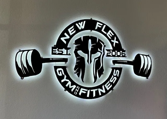 A logo of a gym with the words new flex gym and fitness