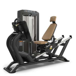 Leg press machine with brown seat.