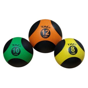 Three colorful medicine balls with weight labels.